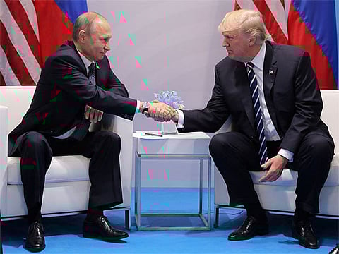 File photo: Vladimir Putin with Donald Trump