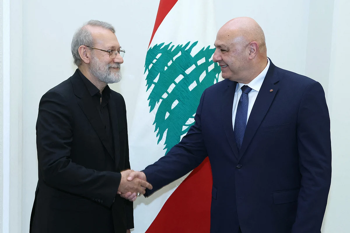 Lebanon's President Joseph Aoun (right) meets with Iran's head of the National Security Council Ali Larijani and a delegation at the Presidential Palace in Baabda on August 13, 2025.