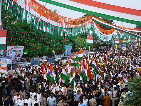 People participate in Tiranga Yatra or tricolour march ahead of Independence Day in Ahmedabad, India, Wednesday, August 13, 2025. 