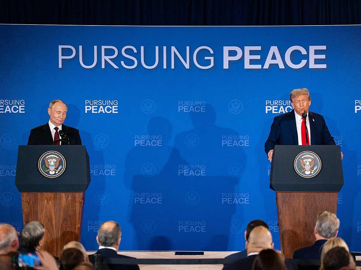 Vladimir Putin, Russia's president, left, and US President Donald Trump during a joint news conference at Joint Base Elmendorf-Richardson in Anchorage, Alaska, US, on Friday, August 15, 2025. 