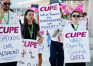 Striking Air Canada workers walk the picket line at Pearson International Airport in Toronto. The strike, from August 16, 2025 grounded hundreds of flights and affected nearly half a million passengers due to cancellations. A tentative agreement on August 19, 2025, ended the strike, with both parties expected to finalise the deal.