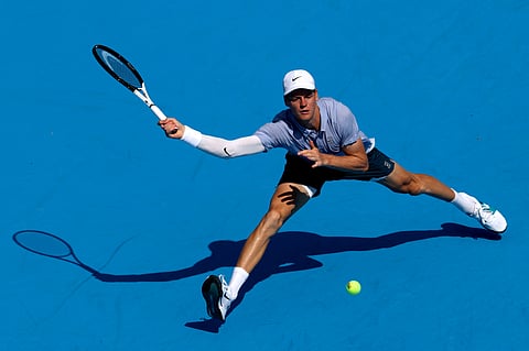 Jannik Sinner of Italy lunges for a ball while playing Terence Atmane of France during the semifinals of the Cincinnati Open at Lindner Family Tennis Center on August 16, 2025 in Mason, Ohio.