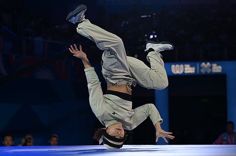 China’s Guo Pu, also known as Royal, competes against France’s Sya Dembele in the women’s breaking b-girls semi-final battle during the 2025 World Games at the Chengbei Gymnasium in Chengdu, in China's southwestern Sichuan province on August 17, 2025.