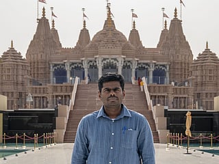 K. Annamalai stands in front of the majestic BAPS Hindu Mandir in Abu Dhabi during his visit.