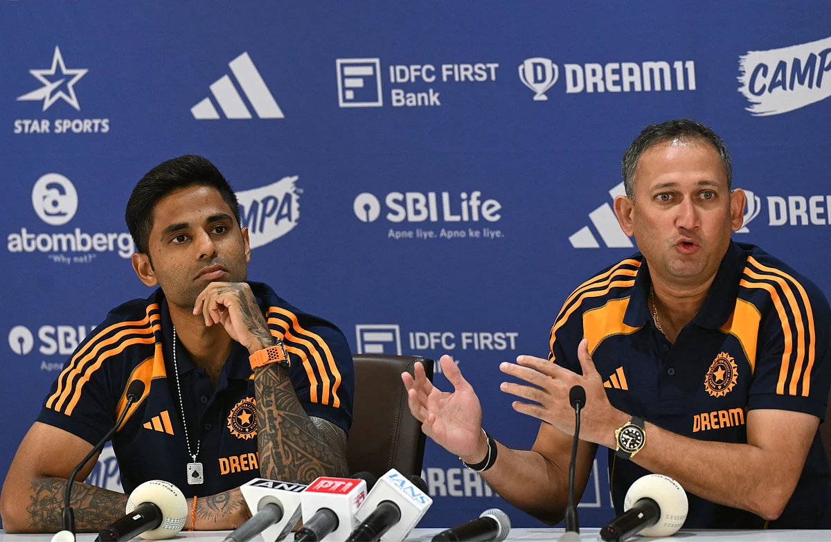 Indian cricket captain Suryakumar Yadav (L) and Ajit Agarkar chairman of Board of Control for Cricket in India (BCCI) selection committee attend a press conference to announce T20 squad for upcoming Men’s Asia Cup, in Mumbai on August 19, 2025.
