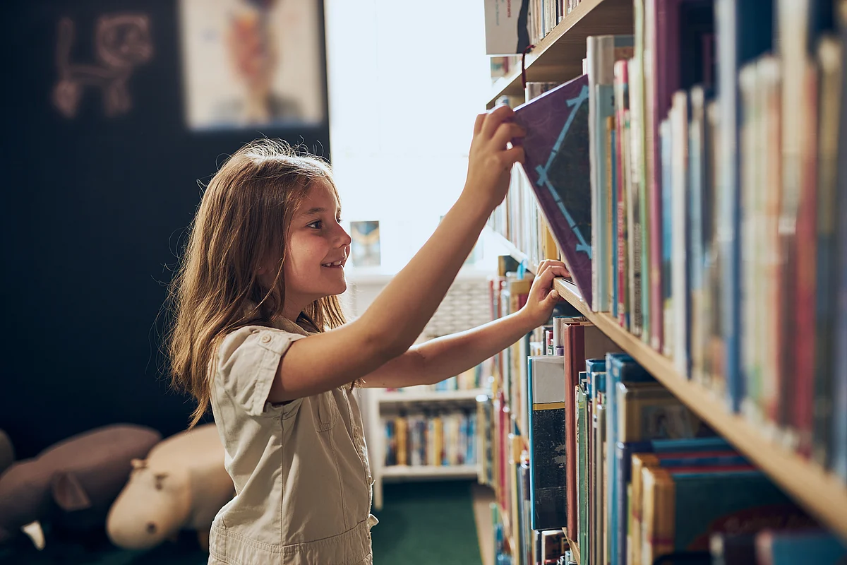 Child in library