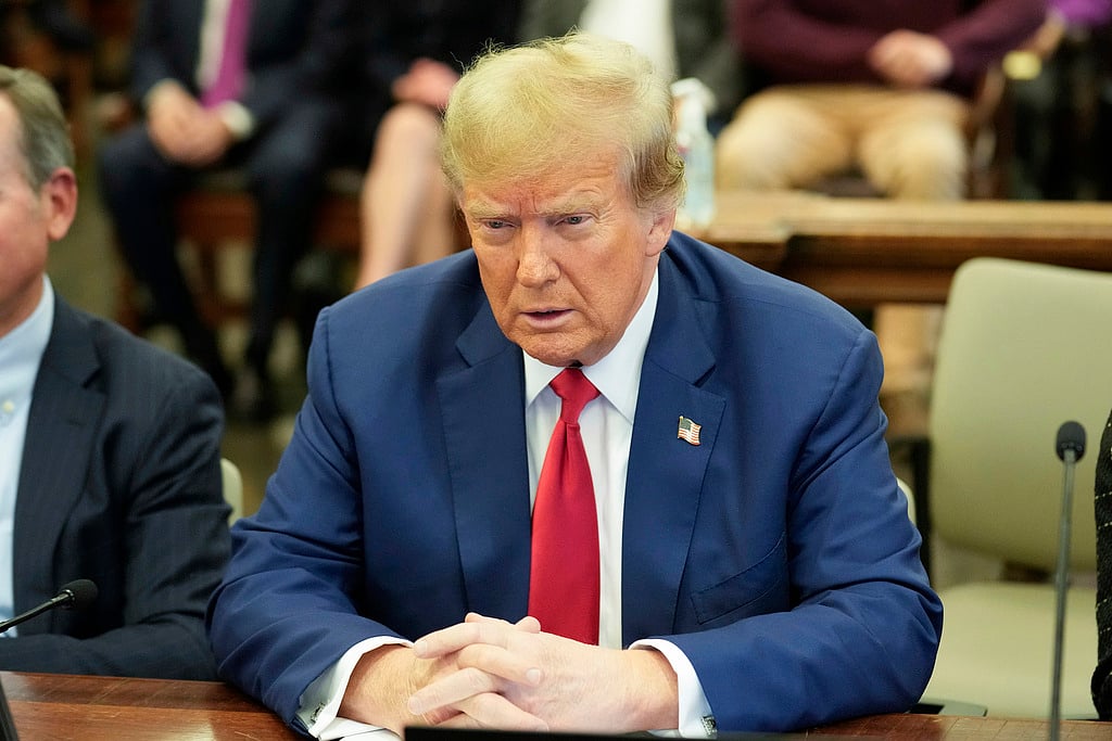 Trump sits in the courtroom before the start of closing arguments in his civil business fraud trial at New York Supreme Court, Jan. 11, 2024, in New York.  
