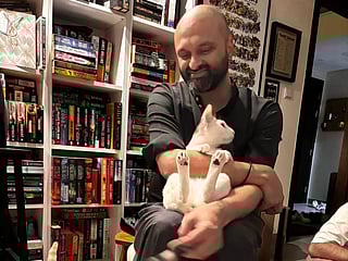 Aldrin Anthony Silva with his cats, Simba and Tino. 