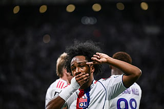 Lyon’s Belgian forward #11 Malick Fofana (C) celebrates after scoring a goal during the French L1 football match between Olympique Lyonnais (OL) and FC Metz at the Groupama Stadium in Decines-Charpieu, central-eastern France on August 23, 2025.