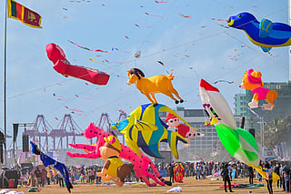 People take part in the Colombo International Kite Festival in Colombo.