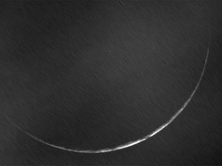 At the time of capture, the moon was 30.5 hours old and positioned 14 degrees from the sun.