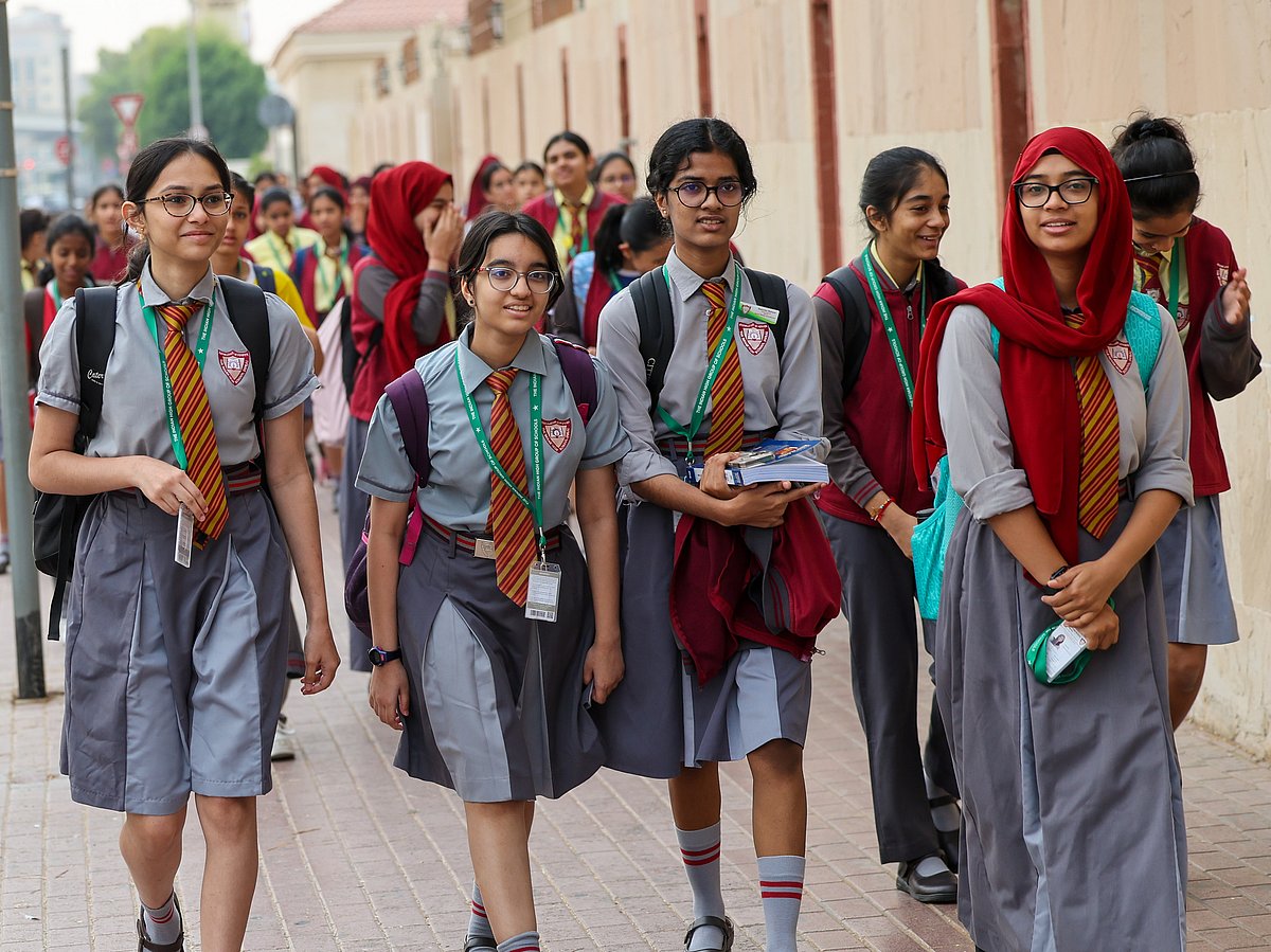 Students arrive at Indian High School in Oud Metha