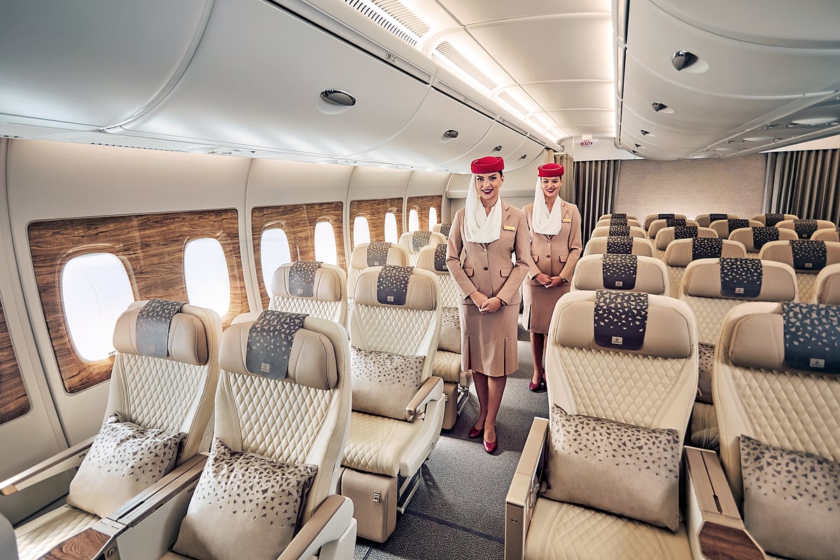 Emirates' Premium Economy cabin features spacious, cream-coloured leather seats with generous legrests and a deeper recline. 