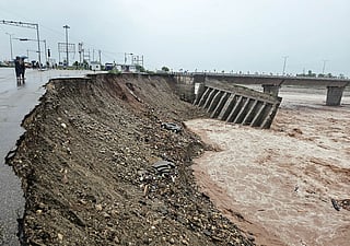 Road near Jammu’s fourth Tawi Bridge washed away after heavy rains on Wednesday. More than 3,500 residents were evacuated in a swift rescue as flash floods and waterlogging hit the region.