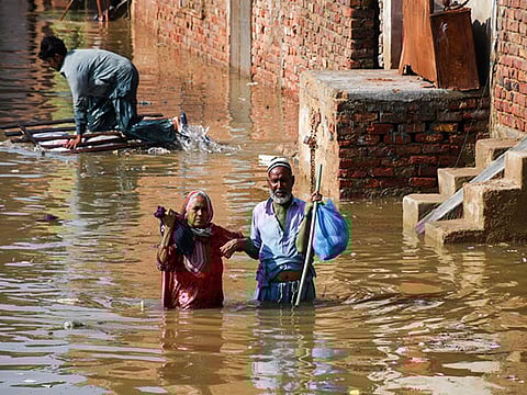 Rescuers in boats raced through submerged villages in Pakistan’s Punjab province on Thursday after three major rivers—the Ravi, Sutlej and Chenab—burst their banks for the first time in 38 years, displacing nearly 250,000 people and affecting 1.2 million others.