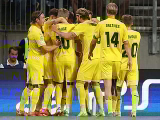 Bodo/Glimt players celebrate scoring the opening goal during the UEFA Champions League second-leg play-off football match against Sturm Graz at the Woerthersee Stadium in Klagenfurt, Austria on August 26, 2025. 
