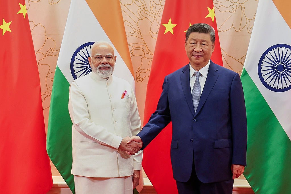 Indian Prime Minister Narendra Modi, left, with Chinese President Xi Jinping before their meeting on the sidelines of the Shanghai Cooperation Organisation (SCO) summit in Tianjin, China, on  August 31, 2025.  