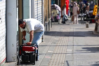 Iran’s small businesses struggle amid daily blackouts