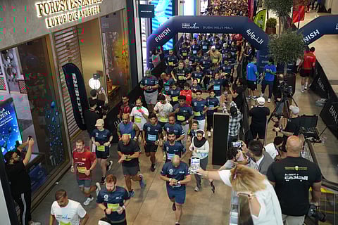 People take part in Dubai Mallathon 2025, at the City Centre Mirdif mall in Dubai on August 9, 2025