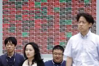 Japan’s Nikkei 225 market index briefly jumped over 5 percent before settling up 4.9 percent at 56,919 points, as of around 9:30 am (0030 GMT) -- the first time it has climbed above 56,000.