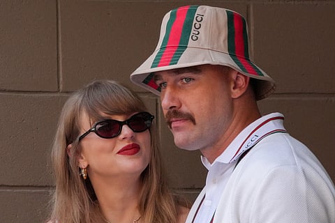 US singer-songwriter Taylor Swift (L) and boyfriend US NFL football player Travis Kelce 