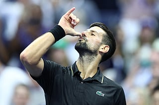 Serbia's Novak Djokovic celebrates with dance moves he choreagraphed with his daughter for K-Pop song Soda Pop at Flushing Meadows on Tuesday.