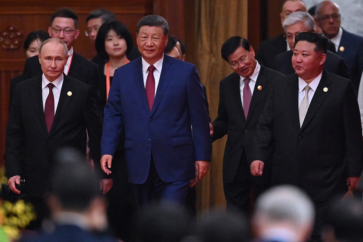 Chinese President Xi Jinping has appeared alongside Russia's Vladimir Putin and North Korea's Kim Jong Un on Wednesday for a once-a-decade military parade that will unveil new weapons and showcase Beijing's diplomatic clout.