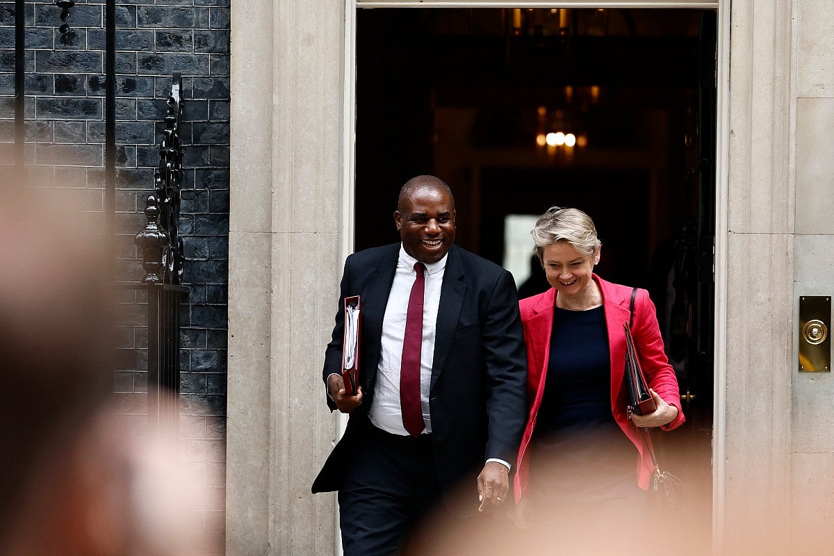 Britain's Foreign Secretary David Lammy (L) and Britain's Home Secretary Yvette Cooper leave after attending a Cabinet meeting at 10 Downing Street in London on July 23, 2024.
