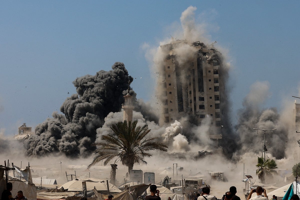 Smoke billows during Israeli strikes on tall building in Gaza City on September 5, 2025, amid the war between Israel and the Hamas militant movement.