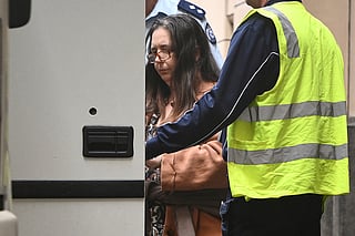 Convicted triple murderer Erin Patterson leaves the Supreme Court of Victoria following her sentencing in Melbourne, Australia.