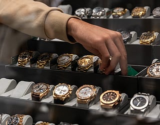 Gold watches are displayed in a window in Manhattan on September 08, 2025, in New York City.