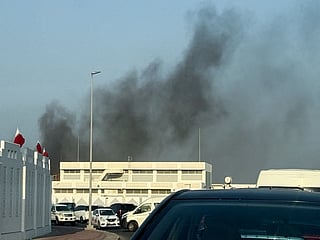 Smoke rises after several blasts were heard in Doha,  
