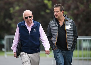 A file photo of Rupert Murdoch (L), and his son Lachlan.