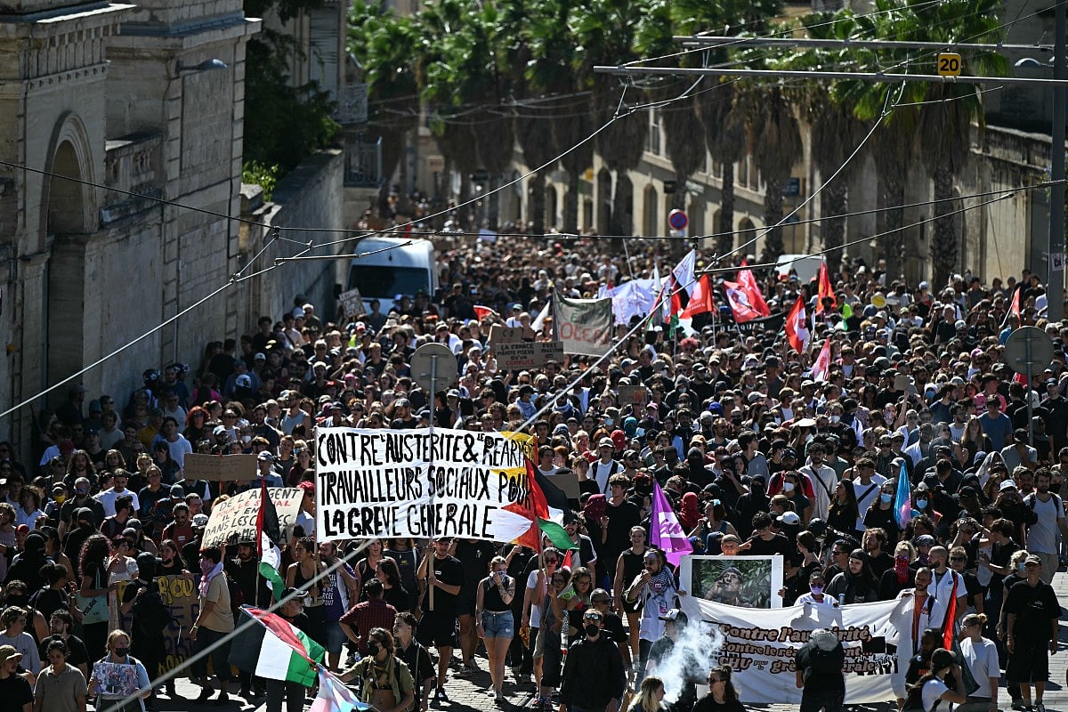 Protesters attend a demonstration part of the "Bloquons tout" ("Let's block everything") protest movement, at the Place de la Comedie, in Montpellier, southern France, on September 10, 2025.