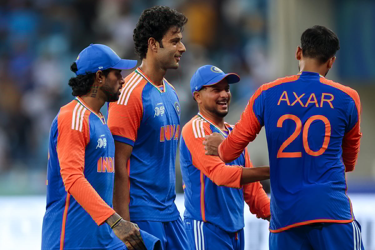 Indian players leave after dismissing UAE for 57 runs during their DP World Asia Cup match at Dubai International cricket stadium on Wednesday.