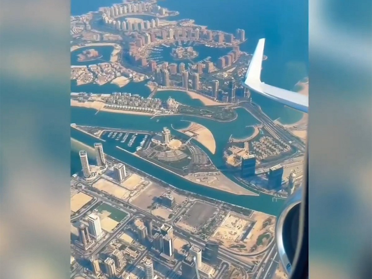 Footage shows a panoramic view of the skyline and urban landscape from above.
