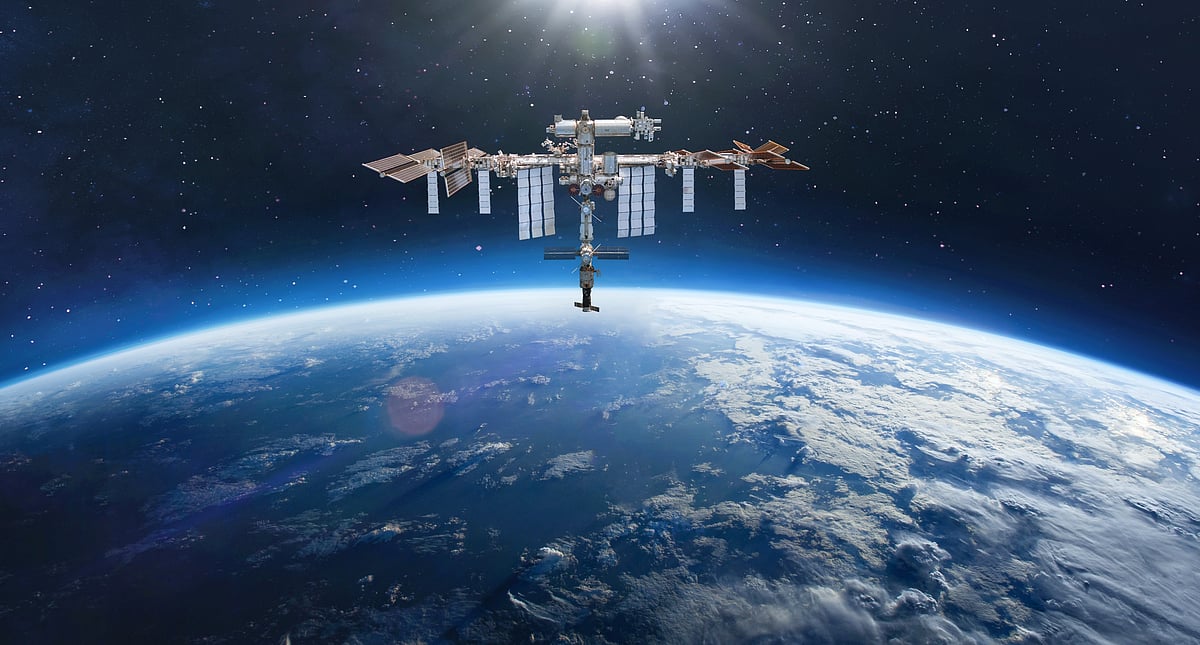 ISS - Space station on orbit of Earth planet. Blue planet and ISS in deep space.