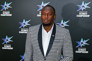 Former Jamaican sprinter Usain Bolt arrives to attend an event celebrating next year’s inaugural Ultimate World Athletics Championship, in Tokyo on September 11, 2025, ahead of the World Athletics Championships.