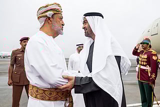 Sheikh Mohamed is received by Sultan Haitham upon arriving at the Royal Flight of Oman.
