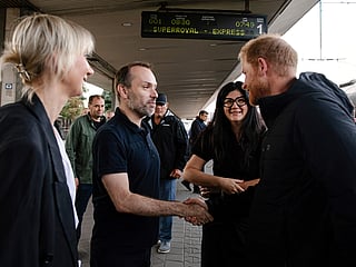 In this photo provided by the Railway of Ukraine Ukrzaliznytsia on Friday, Sept. 12, 2025, Britain's Prince Harry, right, arrives on central railway station in Kyiv region, Ukraine. 