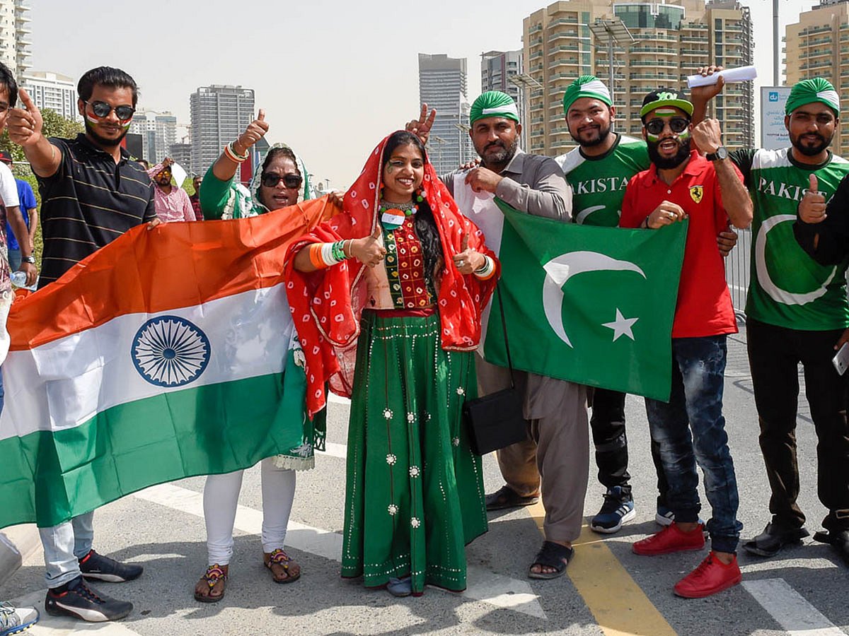 Excited fans from India and Pakistan at Dubai International Cricket Stadium on September 23, 2018, filling the venue with colour and energy ahead of the much-anticipated Asia Cup clash.
