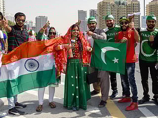 Excited fans from India and Pakistan at Dubai International Cricket Stadium on September 23, 2018, filling the venue with colour and energy ahead of the much-anticipated Asia Cup clash.