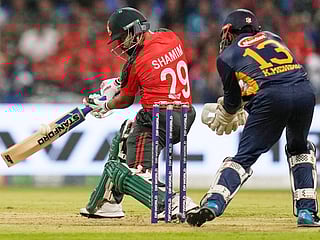Bangladesh's Shamim Hossain bats during the Asia Cup Cricket match between Bangladesh and Sri Lanka at Zayed Cricket Stadium in Abu Dhabi , United Arab Emirates, Saturday, Sept. 13, 2025.
