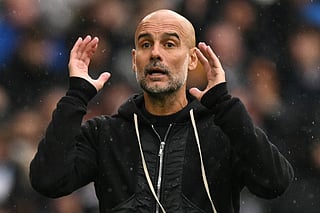 Manchester City's Spanish manager Pep Guardiola gestures during the English Premier League football match between Manchester City and Manchester United at the Etihad Stadium in Manchester, north west England, on September 14, 2025.