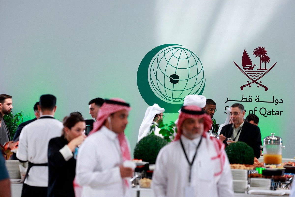 Members of the media gather at the press room reserved for the coverage of the upcoming Arab-Islamic summit, organised to discuss the recent Israeli attack on Qatar, in Doha on September 14, 2025.