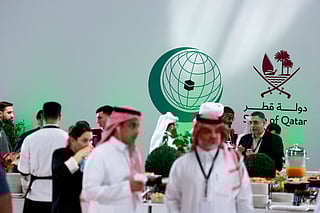 Members of the media gather at the press room reserved for the coverage of the upcoming Arab-Islamic summit, organised to discuss the recent Israeli attack on Qatar, in Doha on September 14, 2025.