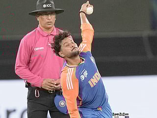 India's Kuldeep Yadav bowls a delivery during the Asia Cup cricket match against Pakistan at Dubai International Cricket Stadium, Sunday, September 14, 2025. 
