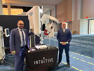 Sherif Beshara (right), Group CEO, American Hospital Dubai and Dr Hatem Moussa, Chief of Surgery and Robotics, American Hospital Dubai stand next to the Da Vinci SP (Single Port) robotic surgical system