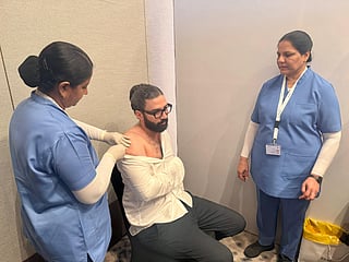 Nurses give a flu shot at the launch of the 2025–26 national influenza awareness campaign. 