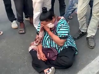 Watch: Woman blocks road after fight over missing food